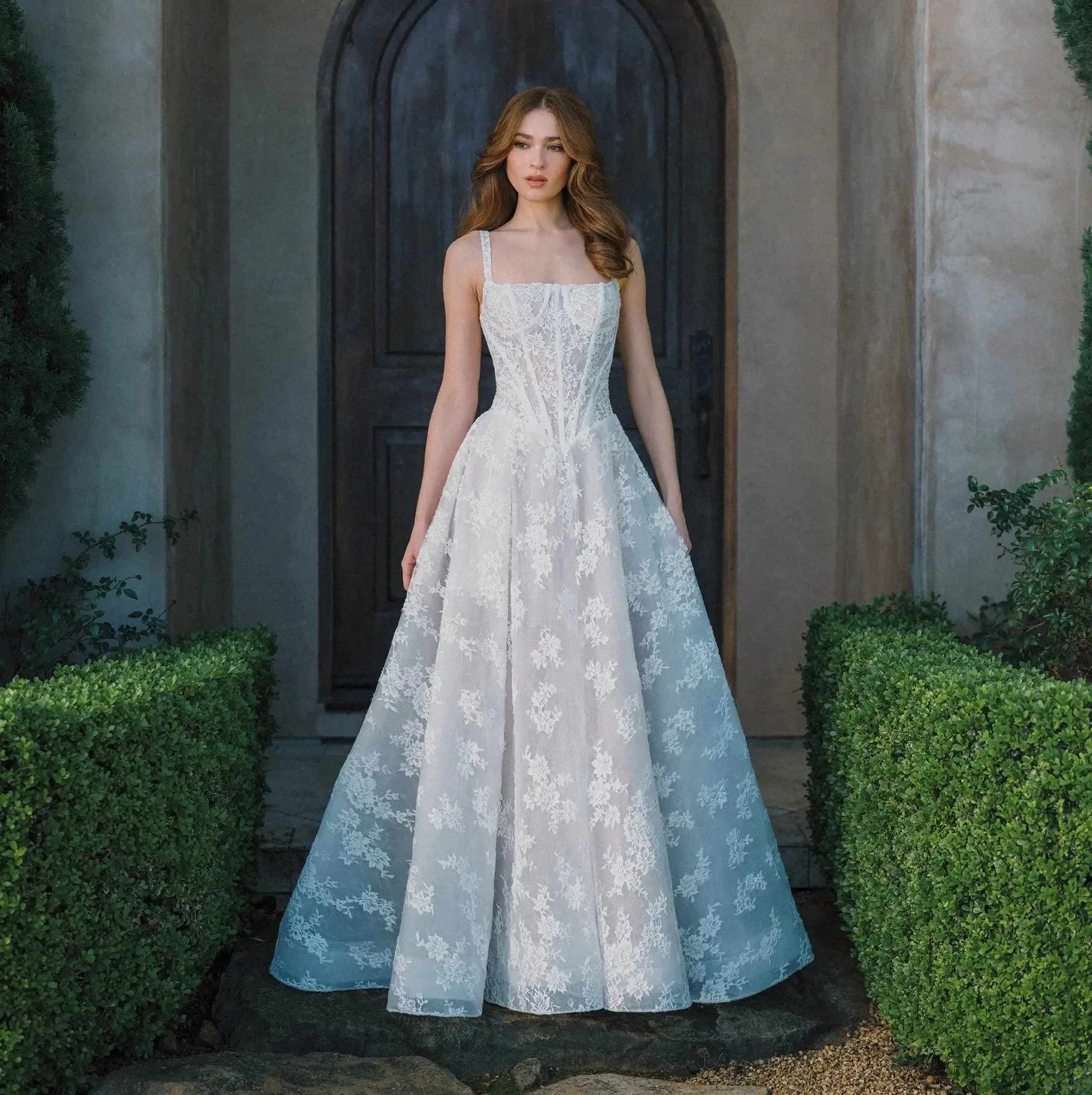 Model wearing a white bridal gown